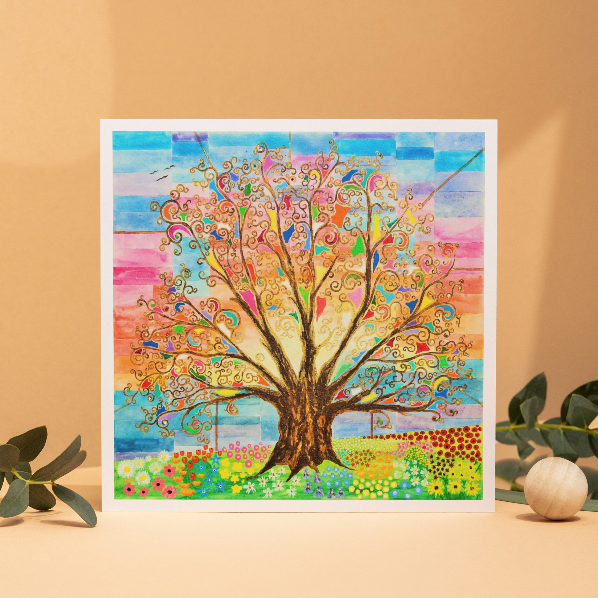 Colourful abstract tree of life painting on a beige background