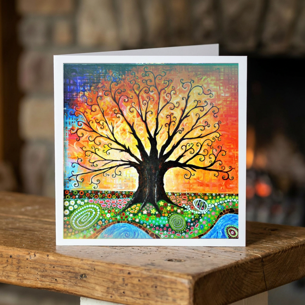 Colourful tree design on a greeting card with a blurred background