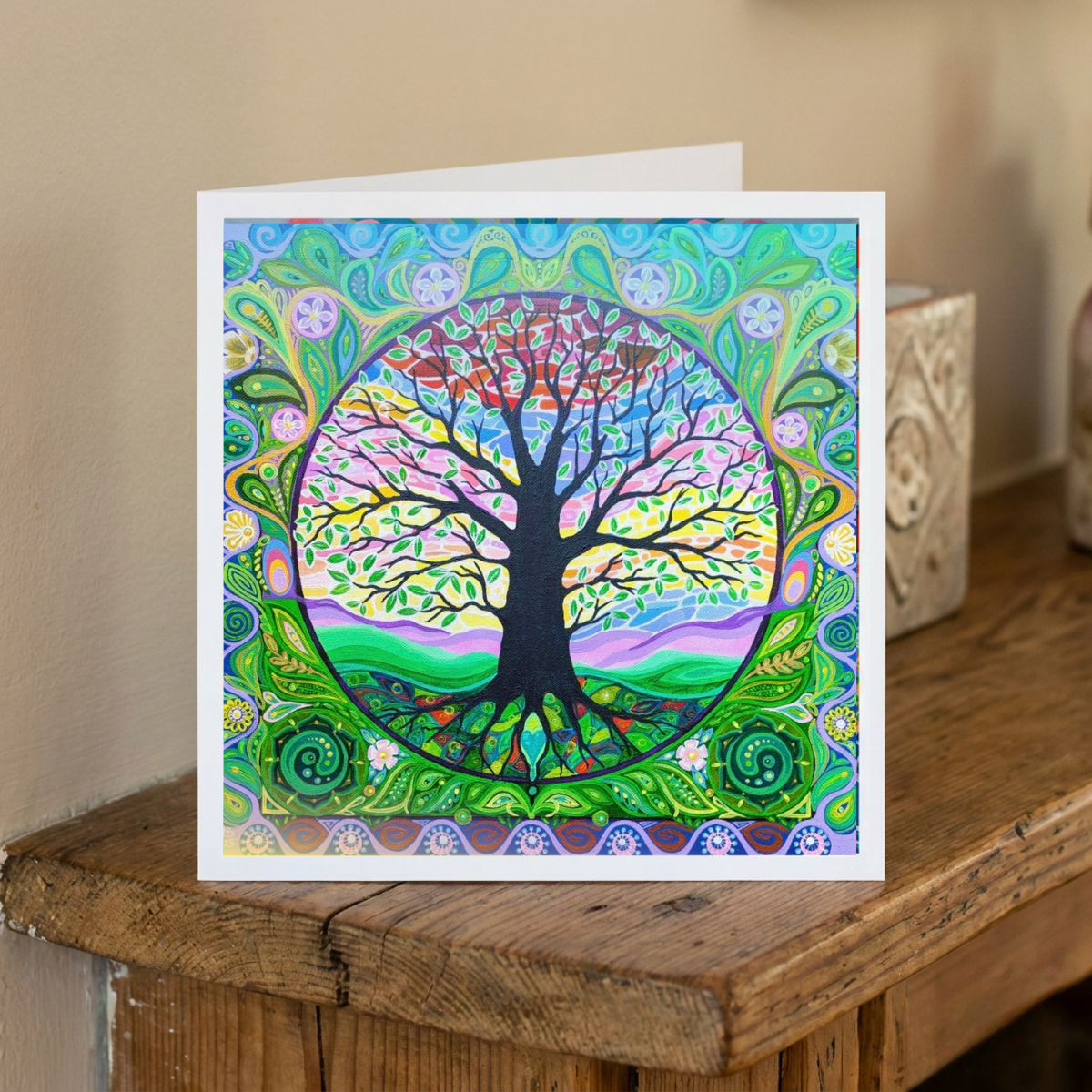Colourful card with a tree design on a wooden surface