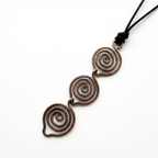 Necklace with spiral design on a white background