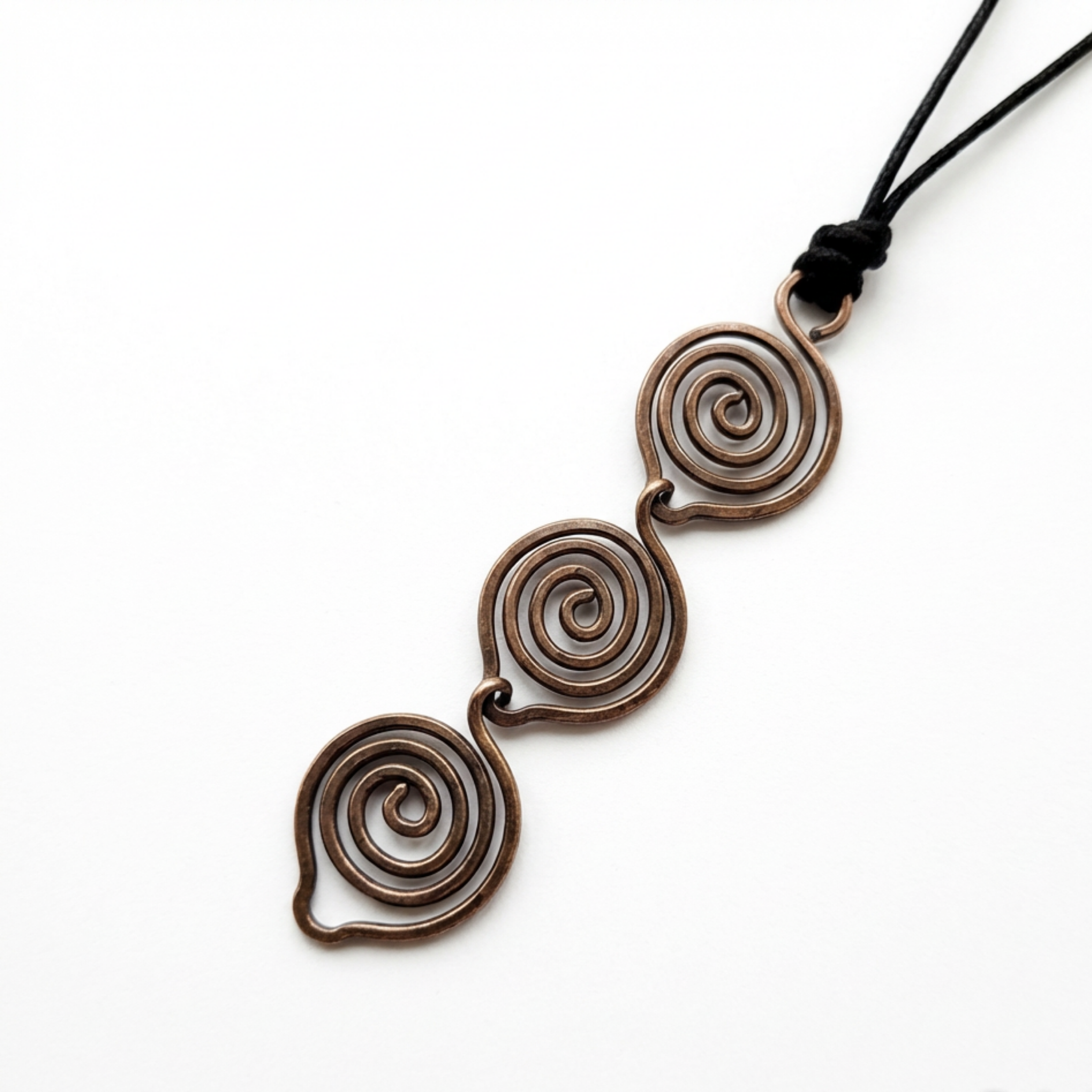 Necklace with spiral design on a white background