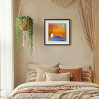 Cozy bedroom with a bed, decorative pillows, hanging plant, and wall art.