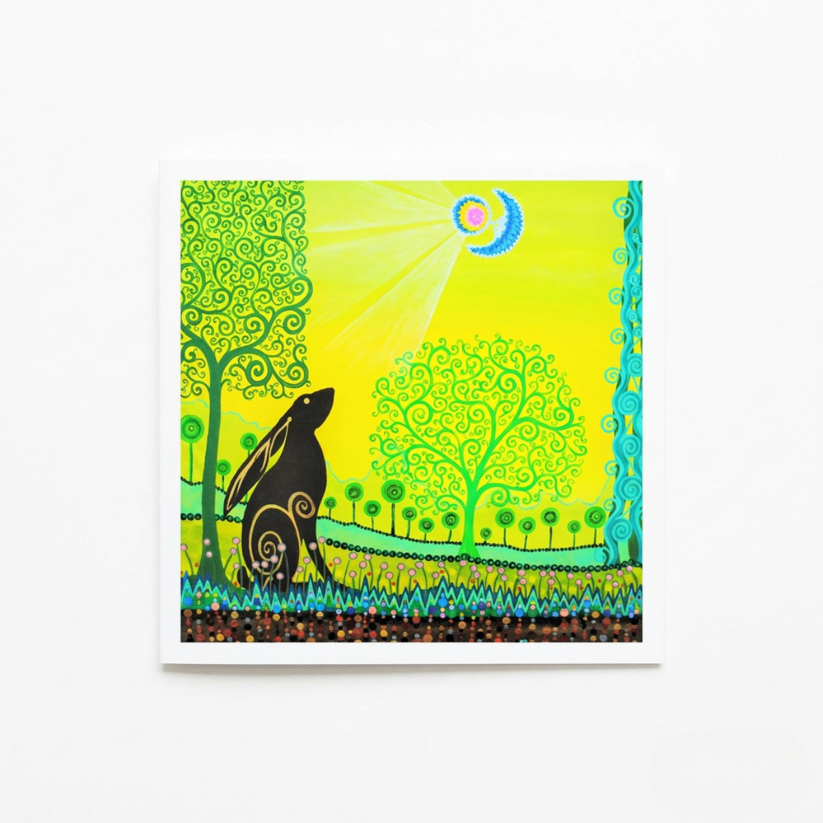 Colourful artwork of a black hare in a stylized forest with trees and a moon.