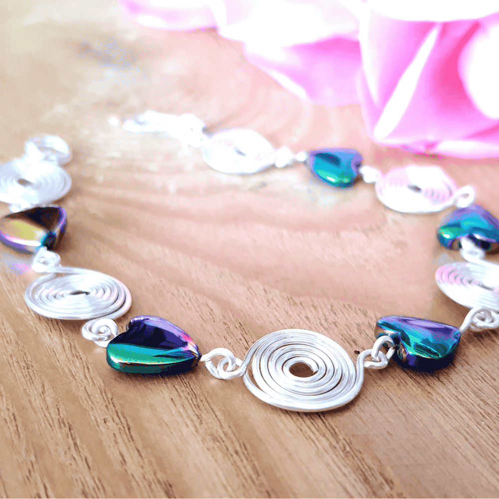 Bracelet with colorful beads on a wooden surface