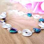 Bracelet with colorful beads on a wooden surface